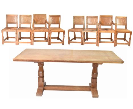 Robert 'Mouseman' Thompson (1876-1955) An oak refectory type dining table and six chairs, circa 1955, the rectangular adzed t