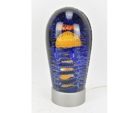 A Monica Backstrom for Kosta Boda limited edition art glass sculpture, modelled with a stylised flower inset in blue glass su