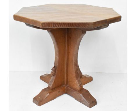 Robert 'Mouseman' Thompson (1876-1955) An oak coffee table, circa 1970/80s, having an adzed octagonal top on cruciform base a