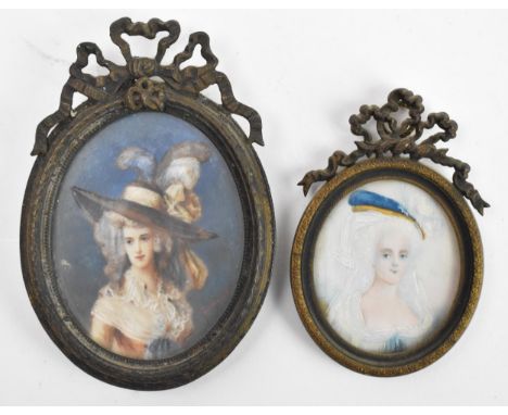 Two French 19th century ivory portrait miniatures each depicting an 18th century lady in plumed hats, the oval metal frames w