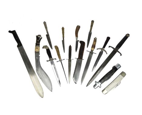 A quantity of edged weapons, including: an MOD pattern knife dated 1979, a kukri with bone and horn grip, a machete, a replic