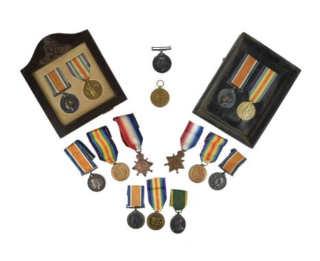 A small collection of Great War medal groups, comprising: three: 1914-15 Star (88860. S. STH. E. C. HURST. R.F.A.)*, British 