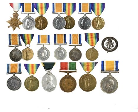 A collection of Great War Medals, groups and singles, comprising: a trio: 1914-15 Star (1929 PTE. A. L. MACK, 18-LOND.R.) wit