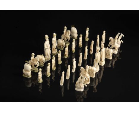 Chess pieces, carved mammoth ivory "Royal figures, elephants, boats and warriors", one of the sets partially dyed green, Russ