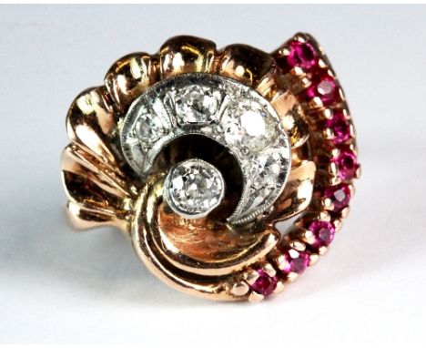 An antique rose coloured metal (tested min 9ct gold) ruby and diamond ring