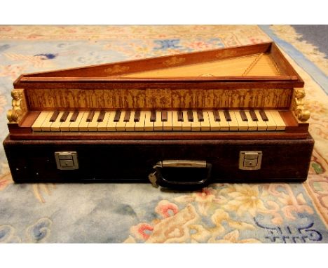 A cased 20th century spinet 68cm x 41cm