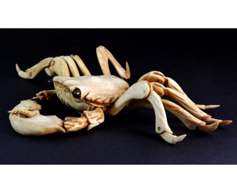 Large articulated carved bone crab (Width 24cm)