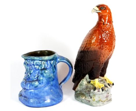 A Barum pottery Toby jug and a Beswick golden eagle decanter