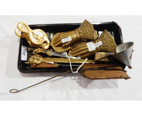 A pair of brass letter holders in the shape of a woman's hand, with lace ruff, a candle snuffer, another letter holder shaped