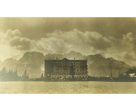 Pair of photographic prints of alpine lake scenes, 27cm x 41cm 