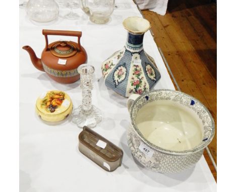 A Masons ironstone chamberpot with Oriental style figures and decoration, in black and blue, on cream ground, a Burslem stone