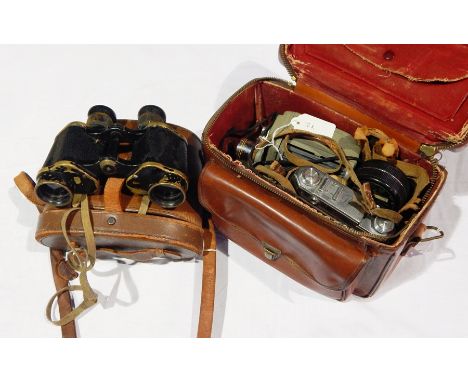 Eumig electric R vintage movie camera, a Kodak Retina IIA camera in case, a light meter, a fitted carry case and a pair of bi