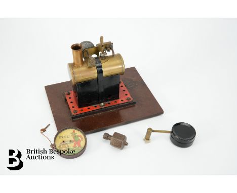 German 1930's Lehman Indus optical trick toy, nr 824 approx 5.2 cms diameter together with a vintage model steam engine.&nbsp