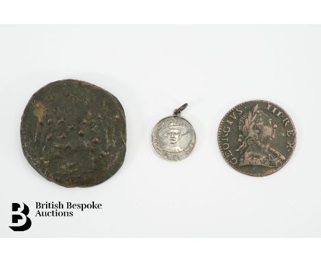 An early bronze coin, surface worn, appears to be a figure on horseback, likely Roman, approx 40mm, approx 64 gms. This lot i