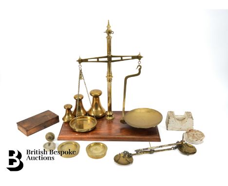 A set of vintage Customs Inspector brass scales, the beam supporting two kinds of circular dished pans, together with a large