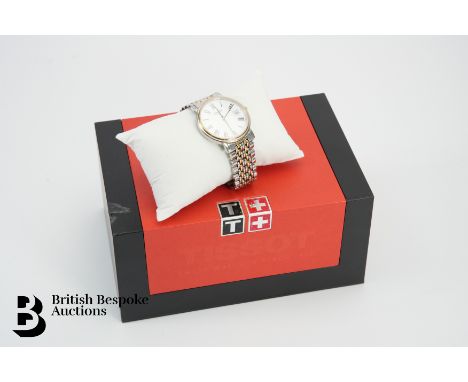 Gentleman's 2010 Tissot Colt stainless and gold plated wrist watch. The watch case 33mm white face, with Roman dial and date 