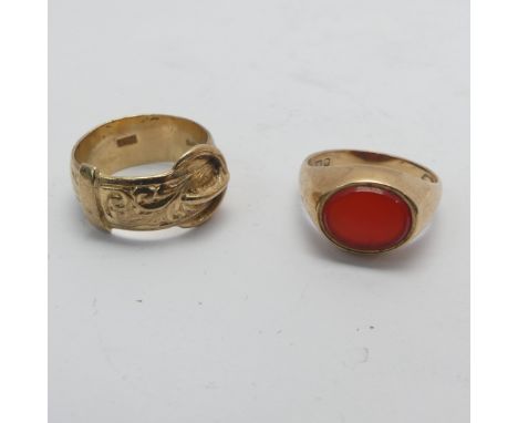 A 9ct yellow gold Buckle Ring, Size K, together with a small carnelian signet ring, mounted in 9ct gold, Size L, total weight