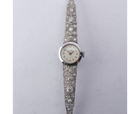 A 9ct white gold and diamond Cocktail Watch,&nbsp;the silvered dial signed Verity, with a Swiss 17-jewels manual wind movemen