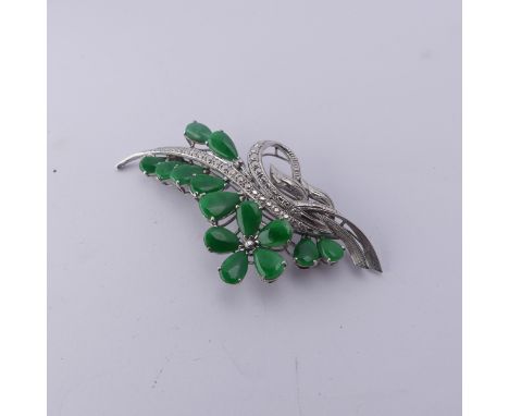 A Chinese white gold and jade foliate Brooch, the reverse marked 18k, circa 1970's, 6.5cm long, total weight 10.8g. 