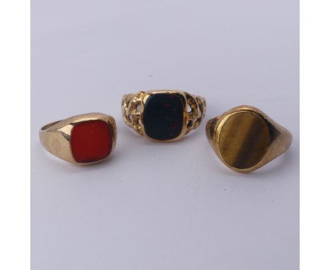 A 9ct yellow gold Signet Ring, the oval front set Tiger's Eye, Size J, together with a bloodstone signet ring, with pierced t