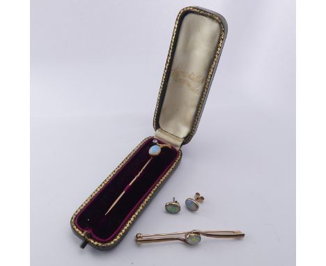 An opal and diamond Stickpin,&nbsp;unmarked, together with a 9ct gold opal bar brooch and a pair of collet set opal stud earr