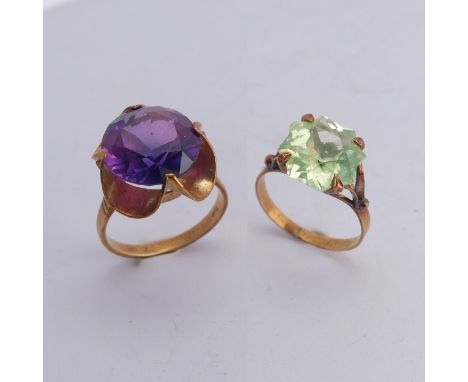 A synthetic sapphire Ring, the colour change circular facetted stone approx. 13.75mm diameter, mounted in 18ct gold, Size Q, 