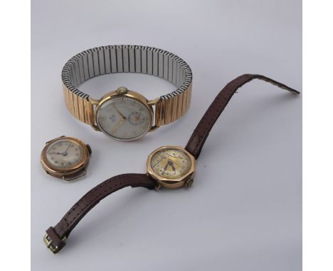 A vintage Smiths De Luxe 9ct gold Wristwatch, the silvered dial with gilt Arabic Numerals and subsidiary seconds dial, 30mm d