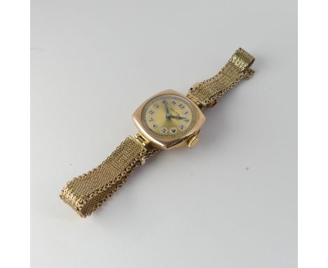 A 1930's 9ct gold Rolex lady's Wristwatch, the signed gilt dial with Arabic Numerals, with a 15-jewels Rolex prima movement, 