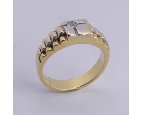 An 18ct yellow and white gold Ring, the squared front set with a small diamond point, with stepped shoulders, Size U, 11g. 