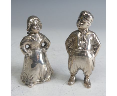 Two Dutch silver novelty Figural Cruets, the lady in full dress with hinged head and pierced bonnet, the gentleman, marked 80