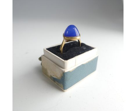 An 18ct yellow gold Dress Ring, set domed blue stone, Size J, 2.5g, together with a small quantity of costume jewellery, incl