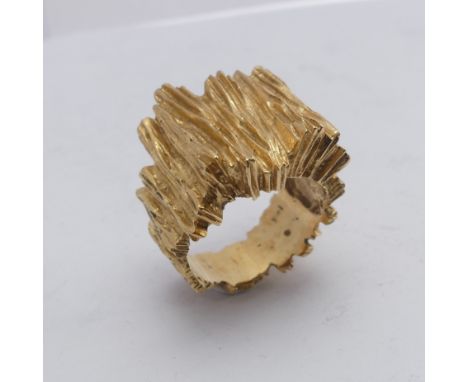 A 14ct yellow gold Ring, with textured bark design, Size M½, 11.8g. 