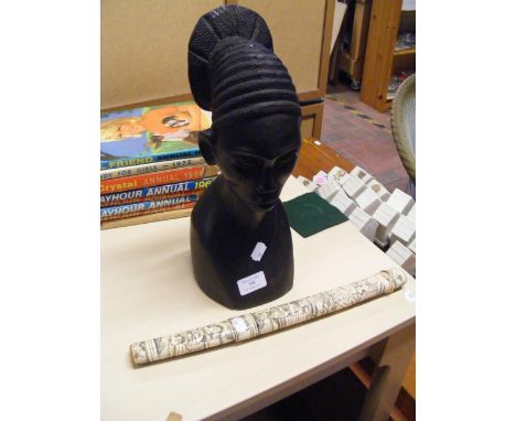 A carved wooden African bust together with a Samurai dagger