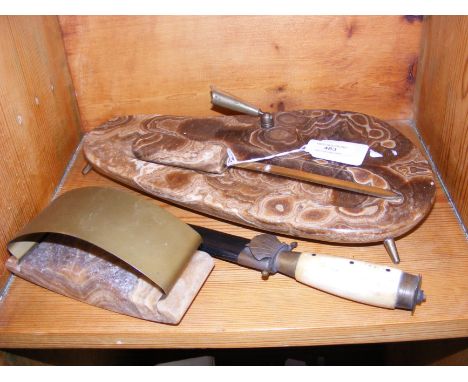 A dagger with leather sheath, pen and letter opener stand etc.