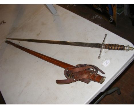 An antique sword by John Hyman, Leicester square, London, with leather scabbard - 106cm longCONDITION REPORTas per images