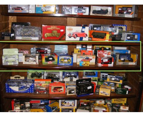 Die cast model vehicles including Corgi Mini Mania and Corgi Classics - on one shelf