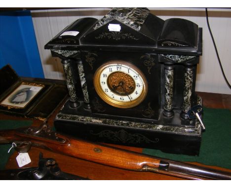 A slate and marble Victorian mantel clock