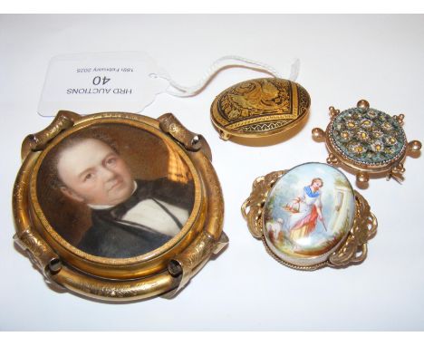 A large oval Victorian portrait miniature pinchbeck brooch, with lock of hair to the reverse, together with three other brooc