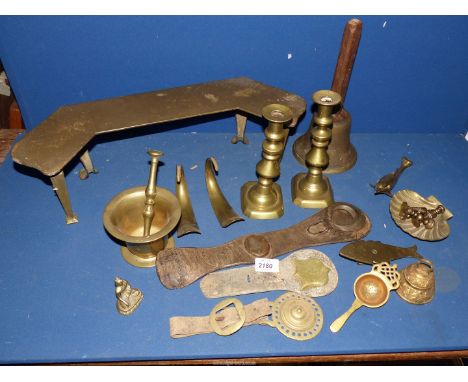 A quantity of brass including candlestick, bell, pestle and mortar, etc.