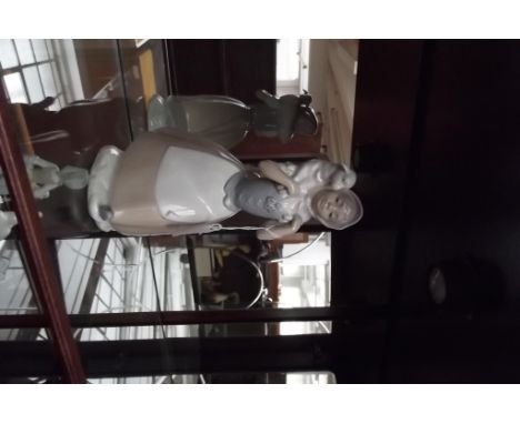 Nao figure of a lady and lamb