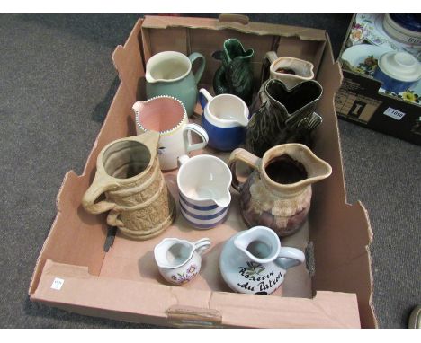 A quantity of jugs, glug jugs, glazed and Poole examples
