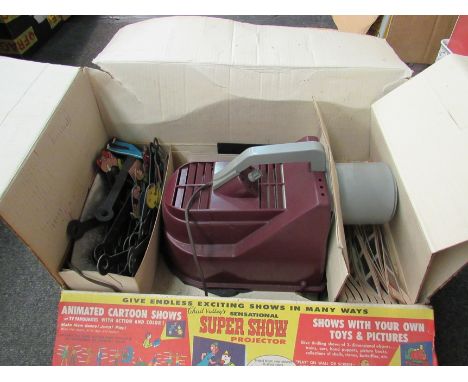 A Chad Valley Sensational Super Show projector, with slides