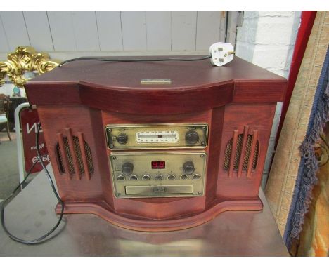 A retro gramophone style record player, CD player and radio