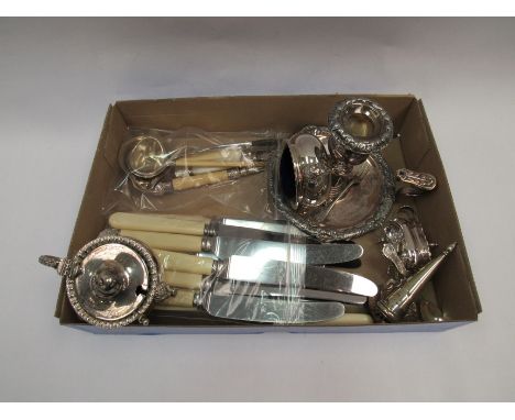 A silver plated mustard and salt, tea caddy spoon, chamber stick, toddy ladle, knives and trident forks