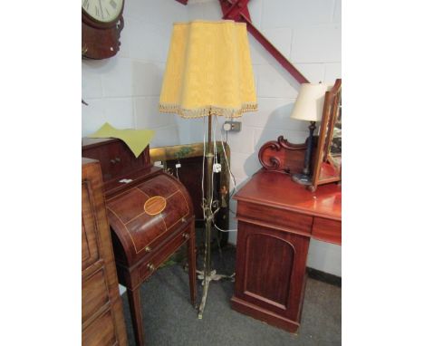 A Victorian brass telescopic standard lamp with silk shade 