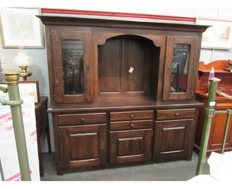 A 20th century oak dresser with glazed door, shelf top over four drawer, three cupboard base, 190cm x 200cm x 55cm