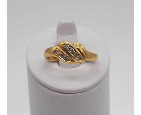 An 18ct yellow gold diamond dress ring, hallmarked 750, size L, 2 rows of diamonds, size, approx weight 3.5 grams, in great c