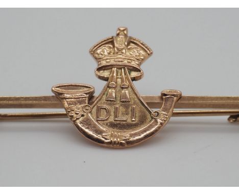 A 9ct yellow gold infantry bar badge, The Durham light infantry badge, approx weight 4.2grams, in great condition