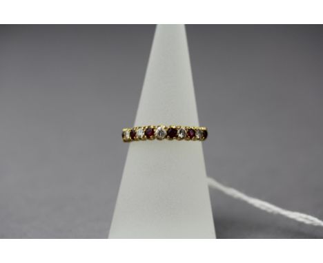 18ct gold ruby and diamond half eternity ring (11 stones 0.05cts each)