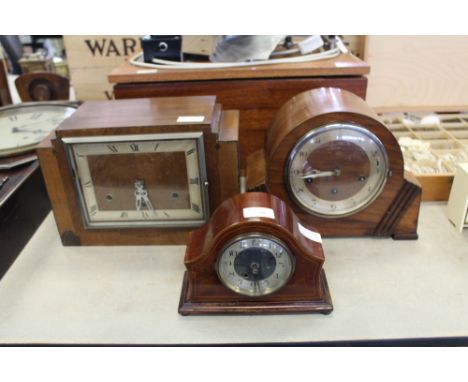 Group of three mantel clocks